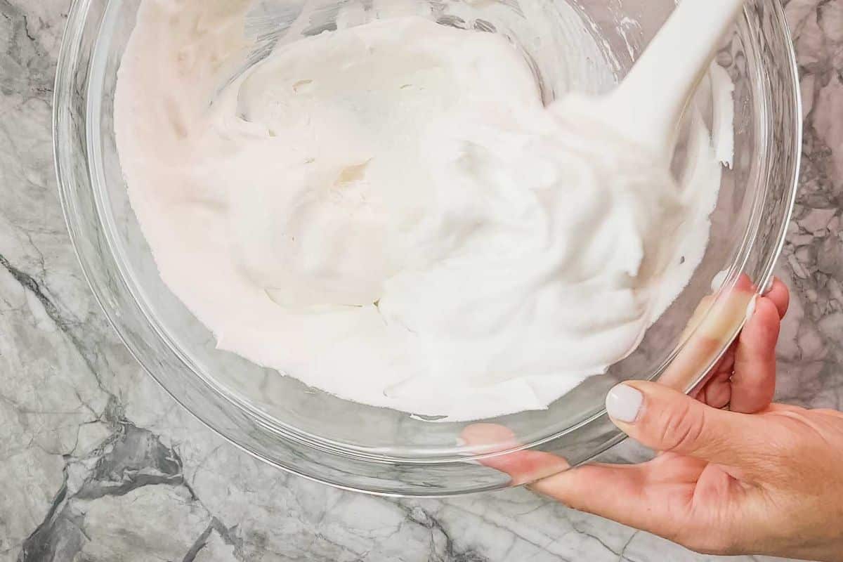 Cream filling in a mixing bowl.