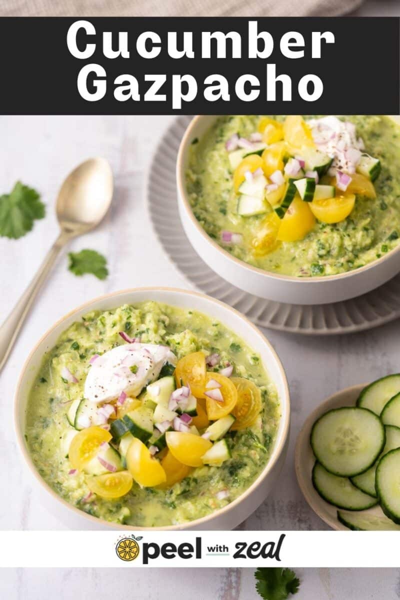 Cucumber Gazpacho topped with cream served in a bowl.