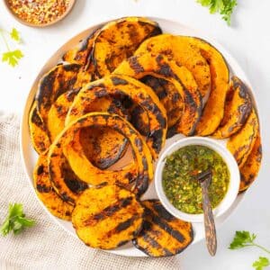 A portion of grilled Butternut Squash served on a dinner plate.