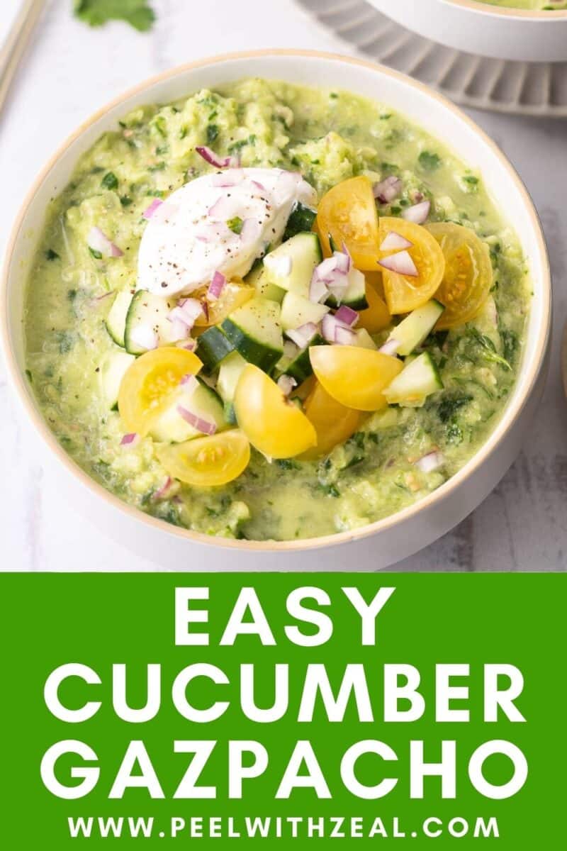 Cucumber Gazpacho topped with cream and tomatoes.
