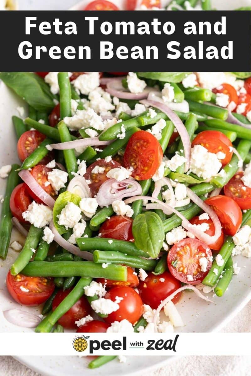 Feta green bean salad on a white platter.