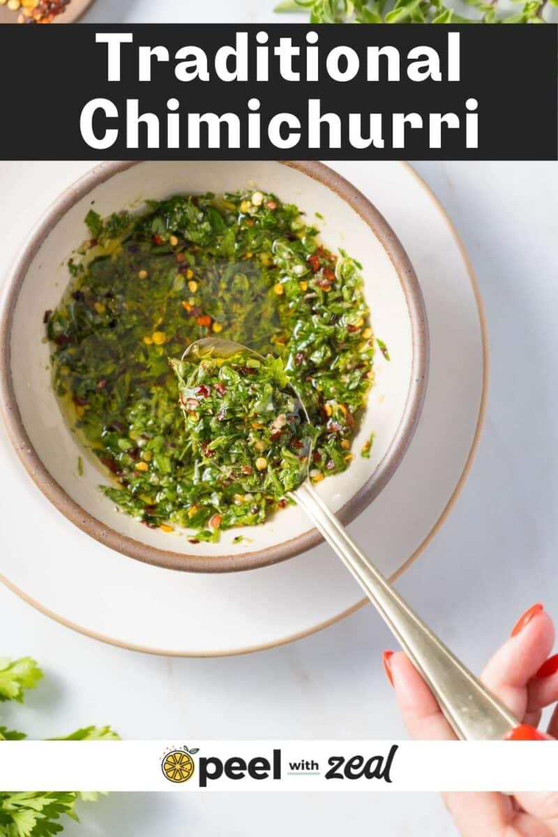 Chimichurri sauce in a bowl with a spoon.