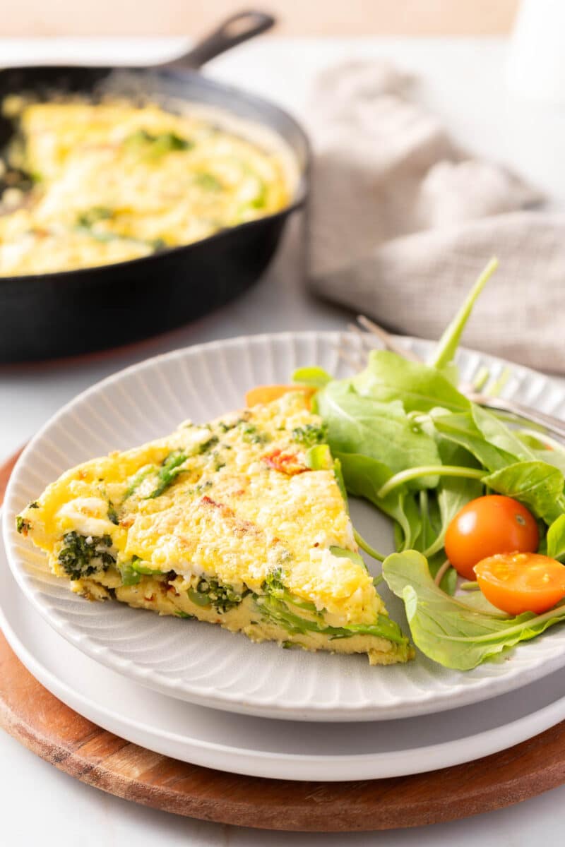 A portion of Broccolini feta Fritata served on the dinner plate.