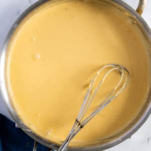 Cheese sauce in a pan.