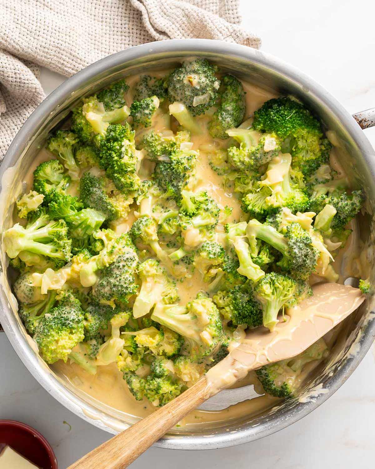 Broccoli with cheese sauce.