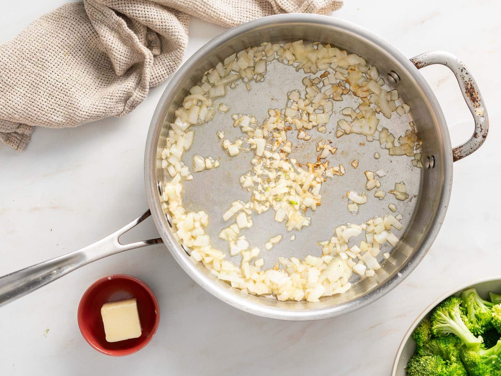 Garlic minced sauteed on a frying pan.