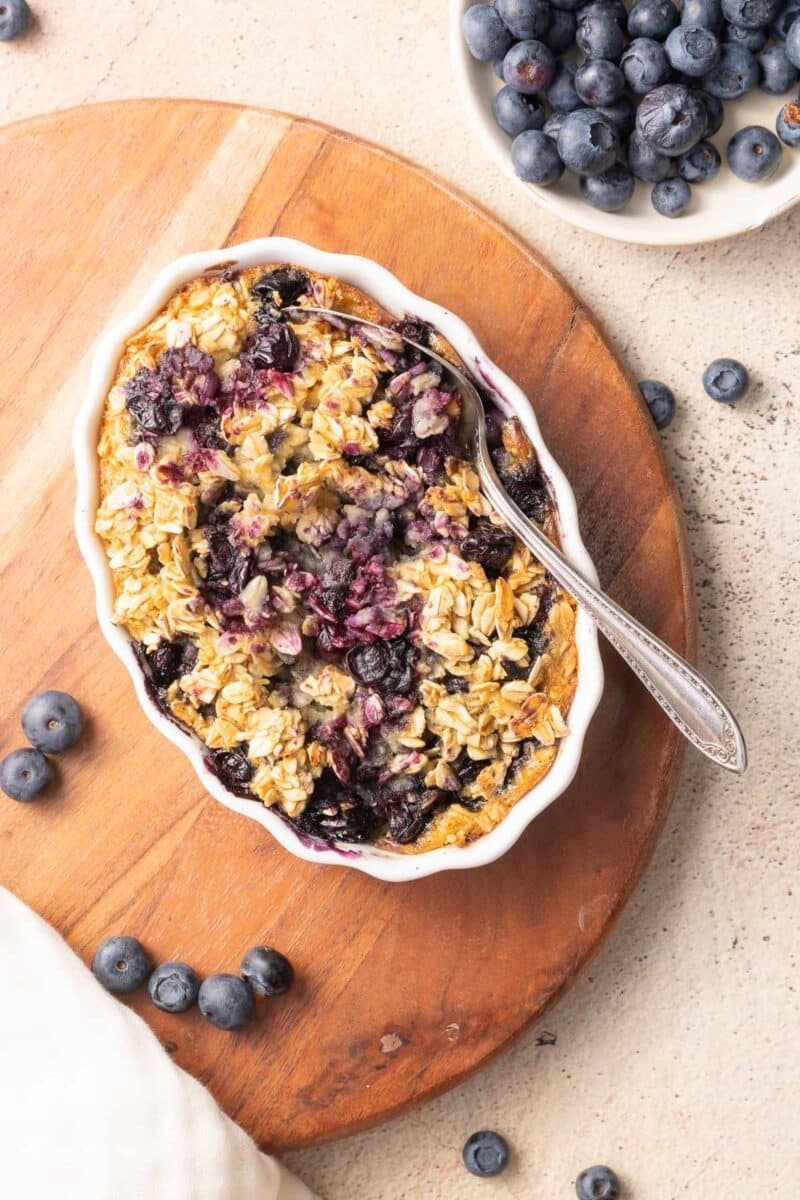Blueberries with oatmeal on a baking dish.