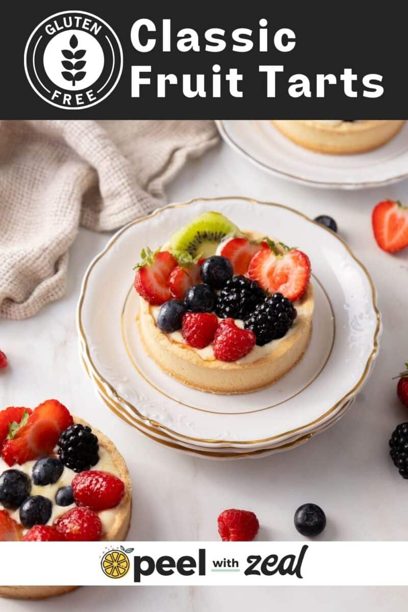 Gluten free fruit tart on a plate.