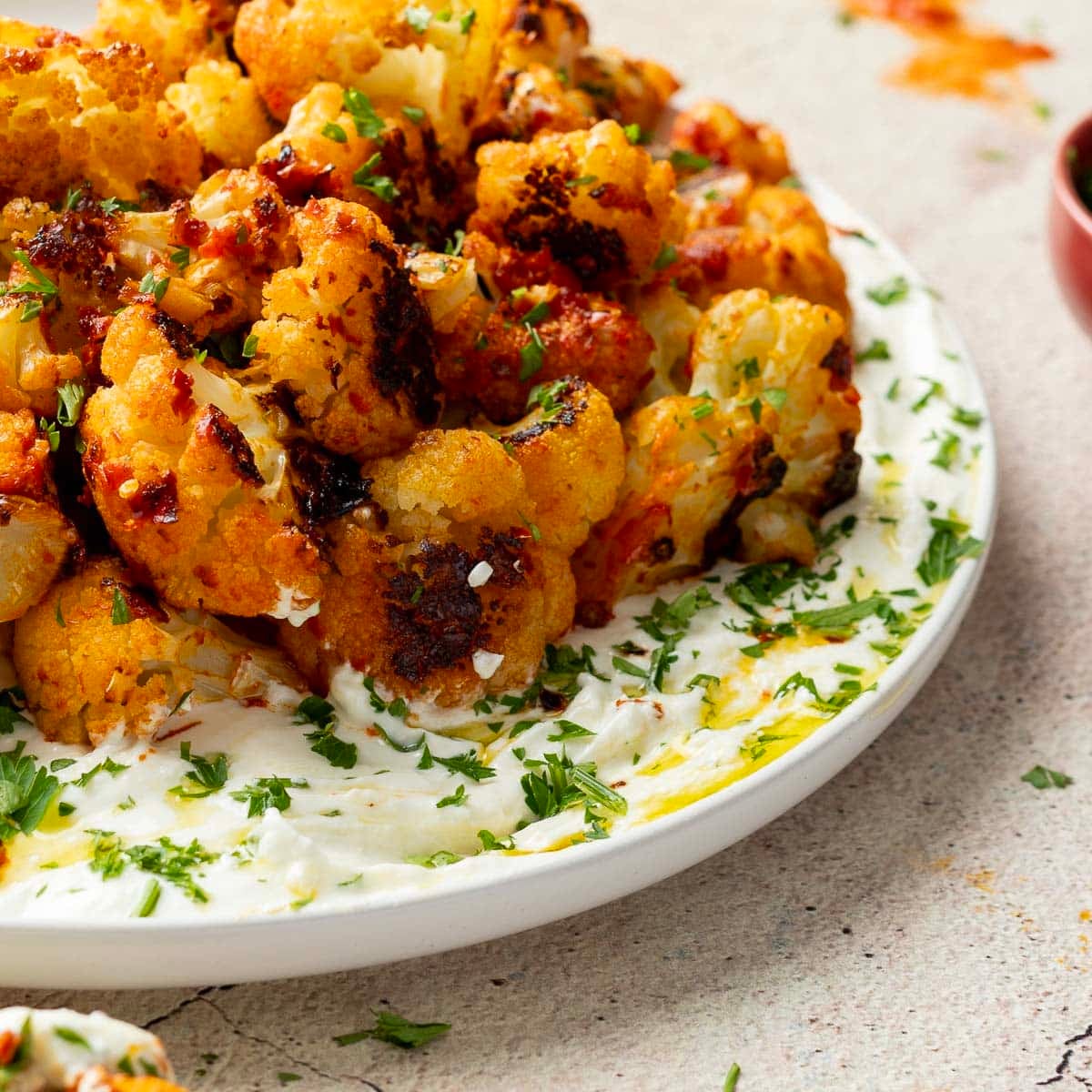 Spicy roasted cauliflower on a plate. 