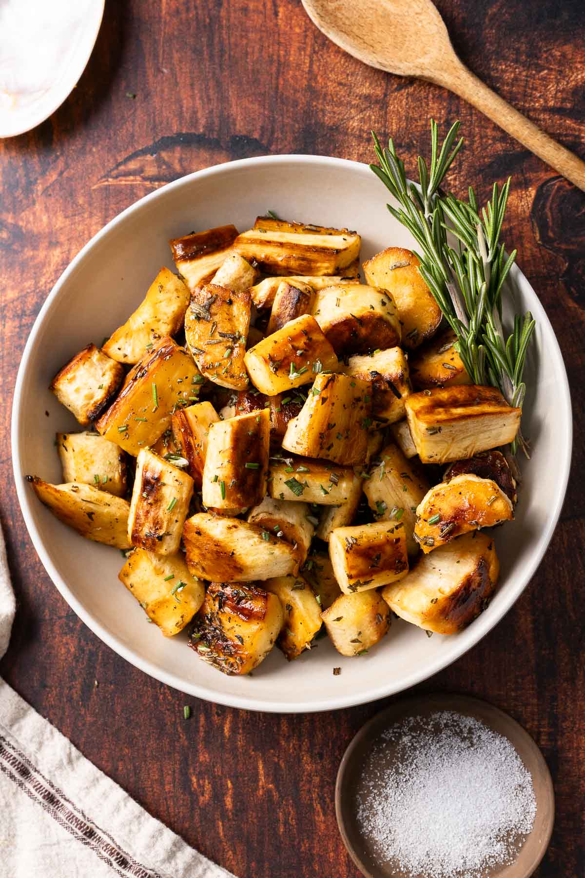 Roasted parsnips in a serving bowl.