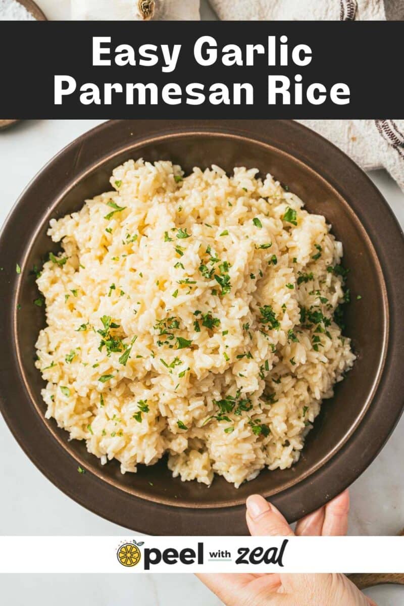 A bowl of garlic parmesan rice garnished with herbs, set on a table. The text overlay reads "Easy Garlic Parmesan Rice" with "peel with zeal" branding.
