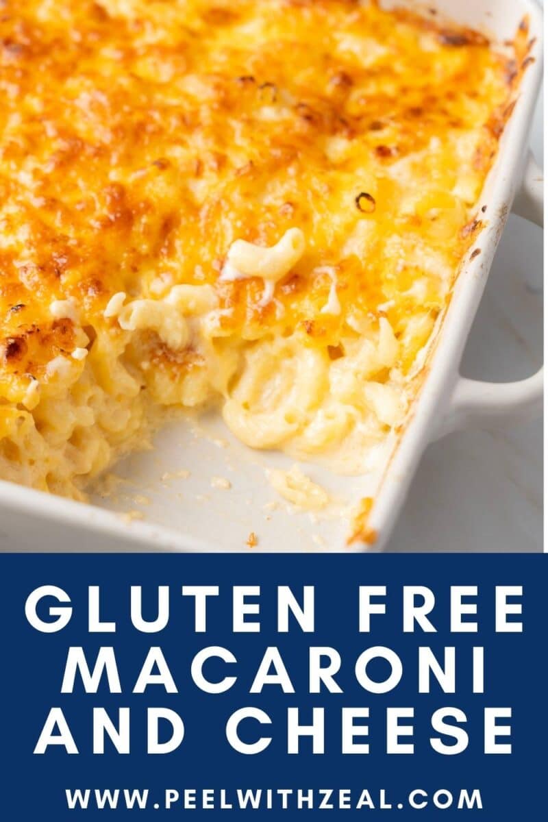 A baked dish of gluten-free macaroni and cheese with a golden, crispy top. Some portions have been served, revealing the creamy interior. Text reads "Gluten Free Macaroni and Cheese.