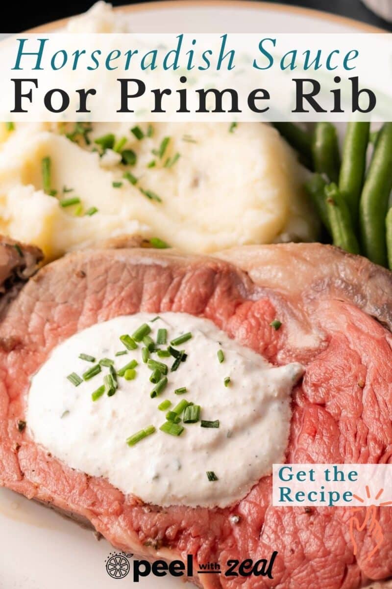 Close-up of a sliced prime rib topped with creamy horseradish sauce and chives, served alongside fluffy mashed potatoes and crisp green beans. Text overlay reads: "Horseradish Sauce For Prime Rib - Get the Recipe.