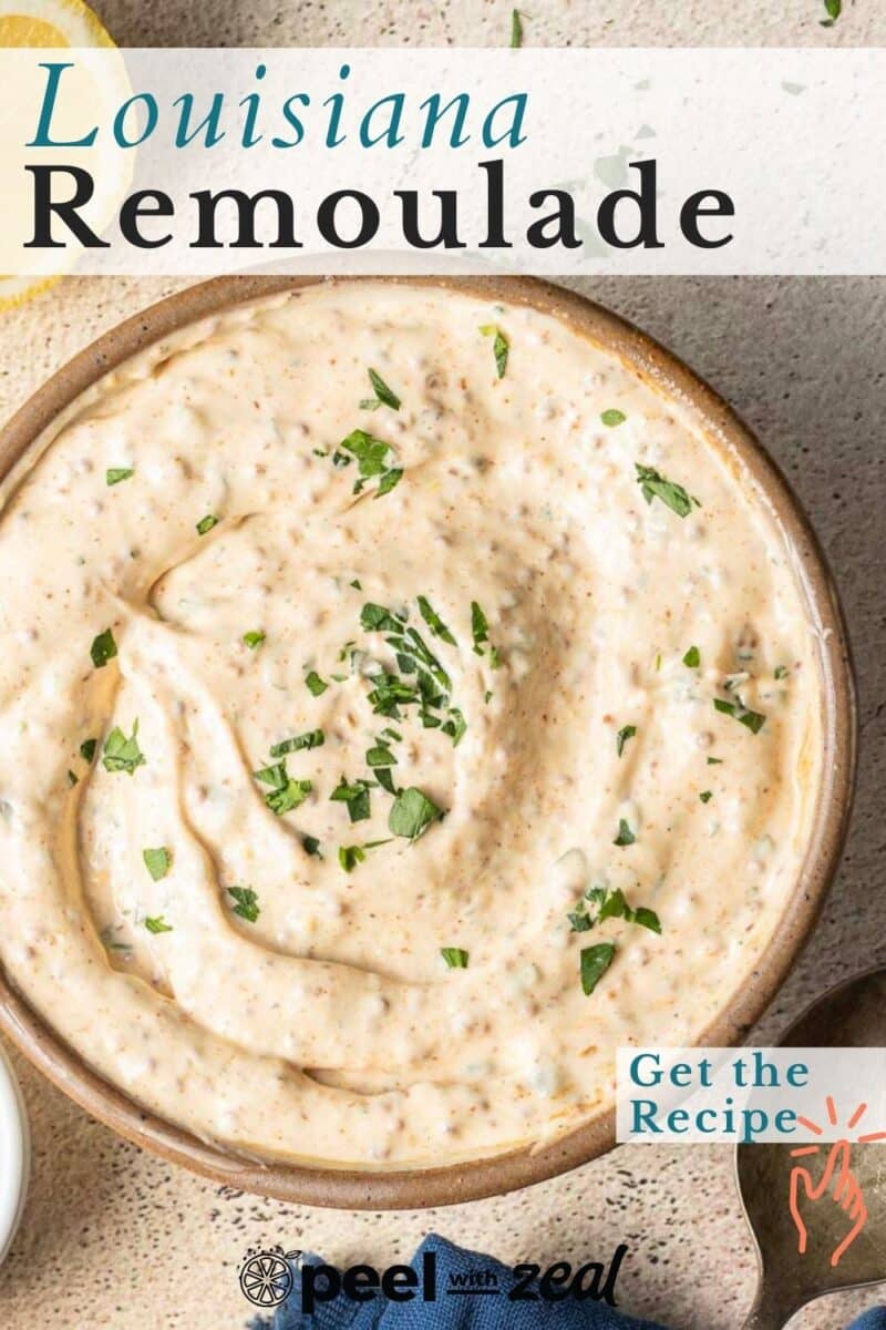 A bowl of creamy Louisiana remoulade garnished with herbs. Text on image: "Louisiana Remoulade" and "Get the Recipe".