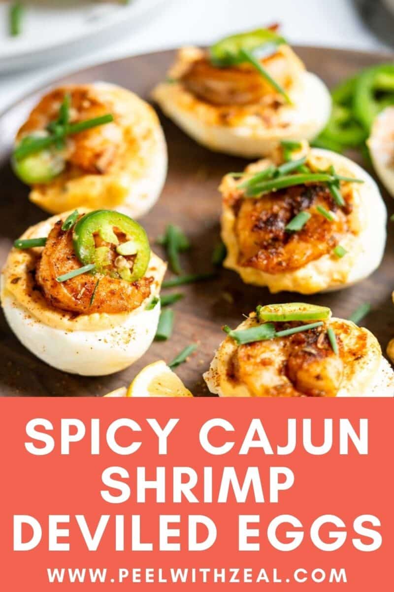 Deviled eggs topped with Cajun-seasoned shrimp and sliced jalapeños.