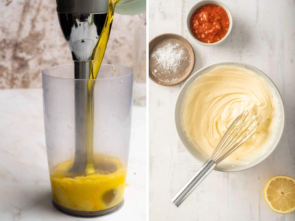 Immersion blender in a cup with egg yolks on left; whisk in a bowl with creamy aioli, small bowls of spicy seasoning, and lemon half on right.