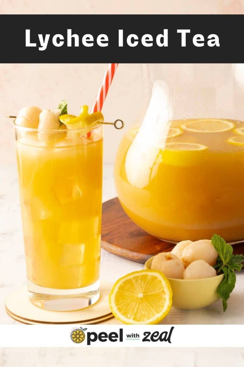 A refreshing glass of lychee iced tea with garnish sits beside a pitcher, brimming with more lychee iced tea and infused with vibrant lemon slices.