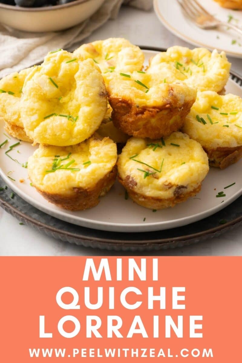Plate of mini quiche Lorraine muffins topped with chives on a table, with text "MINI QUICHE LORRAINE" below.