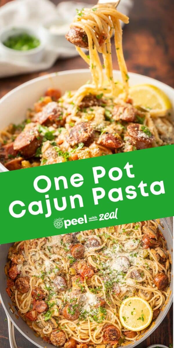 A dish of spicy Cajun sausage spaghetti with vibrant vegetables, topped with melted cheese and garnished with a hint of lemon and fresh herbs.