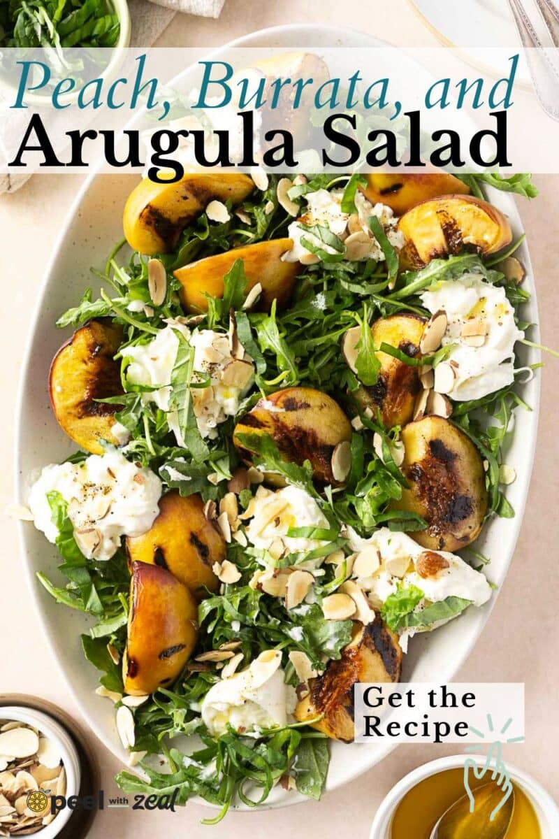 A vibrant salad featuring grilled peach, creamy burrata cheese, fresh arugula, and crunchy sliced almonds. Text overlay: "Grilled Peach, Burrata, and Arugula Salad. Get the Recipe.