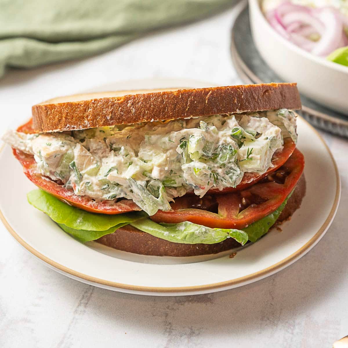 tzatziki chicken salad sandwich on a plate