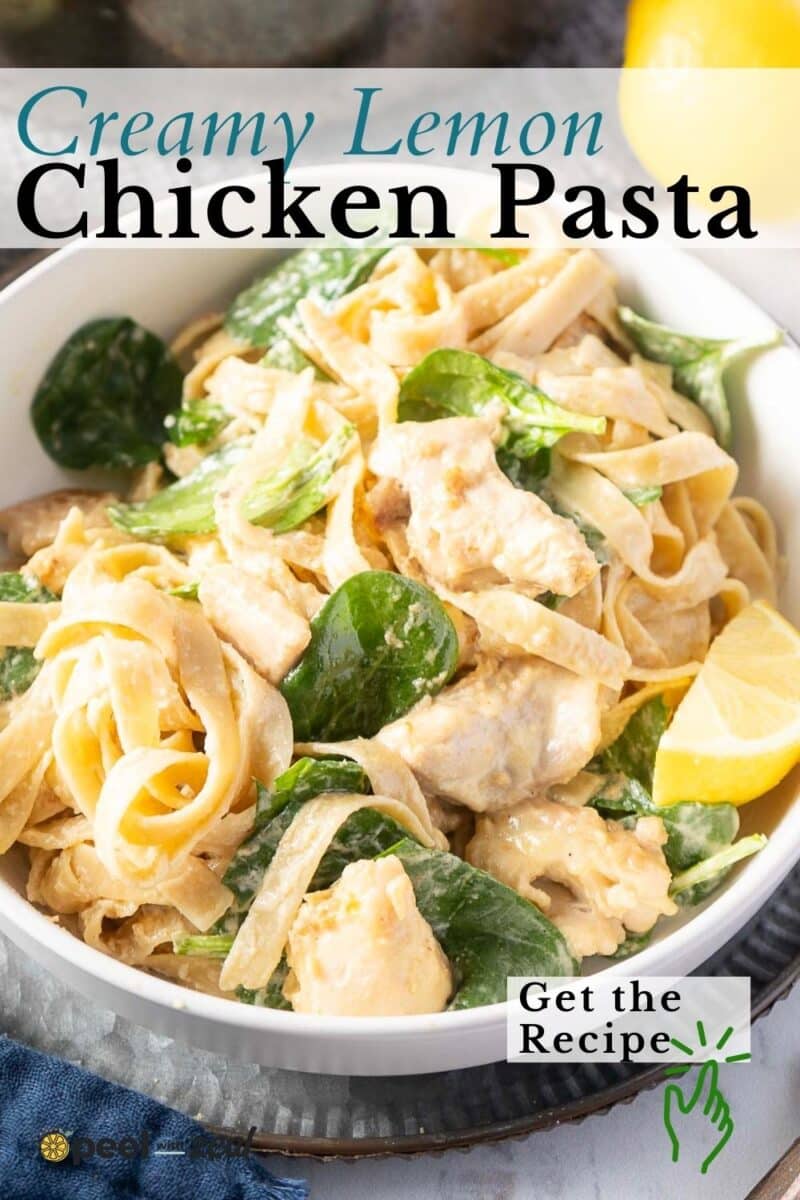 A bowl of luscious lemon chicken pasta with spinach. Text overlay: "Creamy Lemon Chicken Pasta Delight. Get the Recipe.