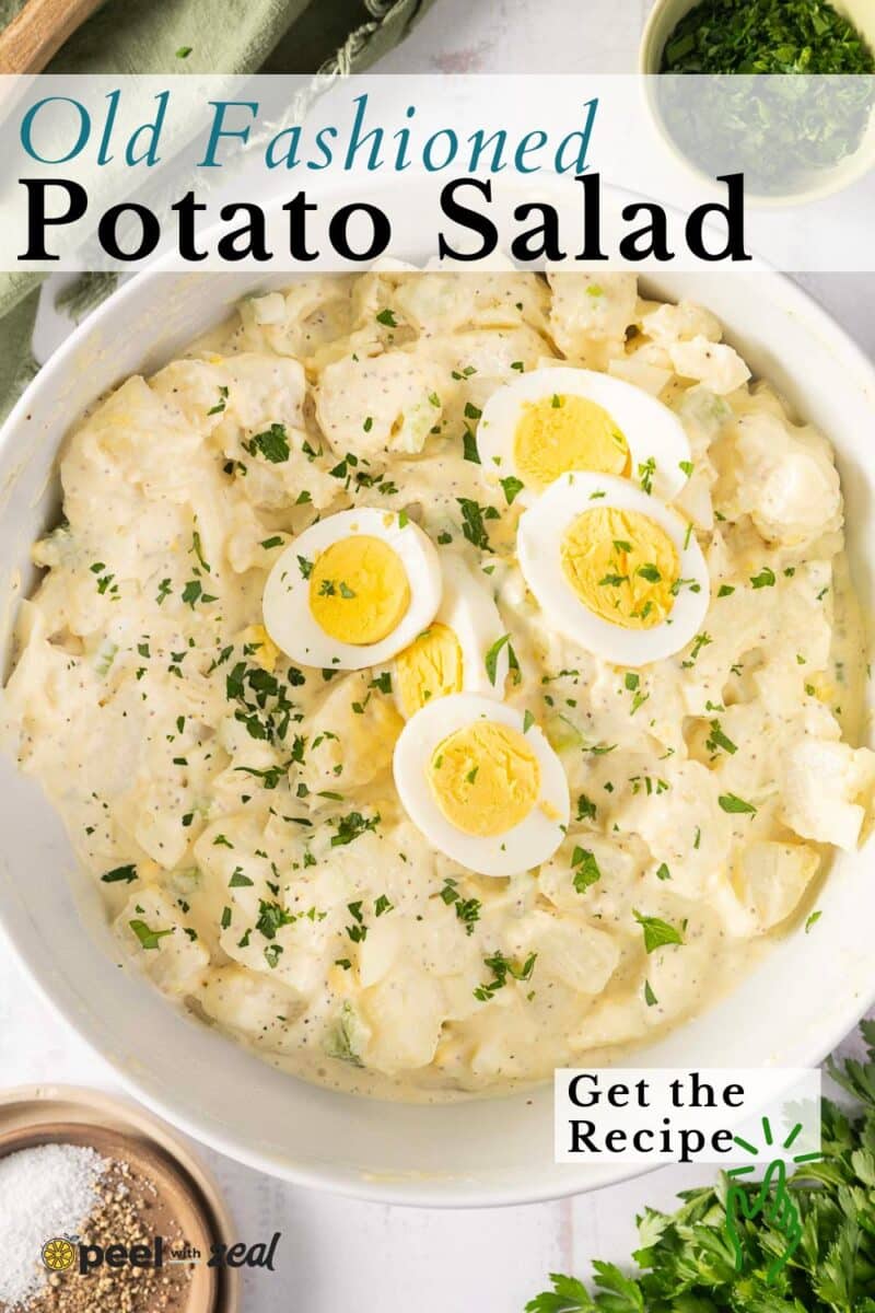 A bowl of creamy, old fashioned potato salad topped with sliced boiled eggs and sprinkled with chopped herbs. Includes text "Old Fashioned Potato Salad" and "Get the Recipe.”.
