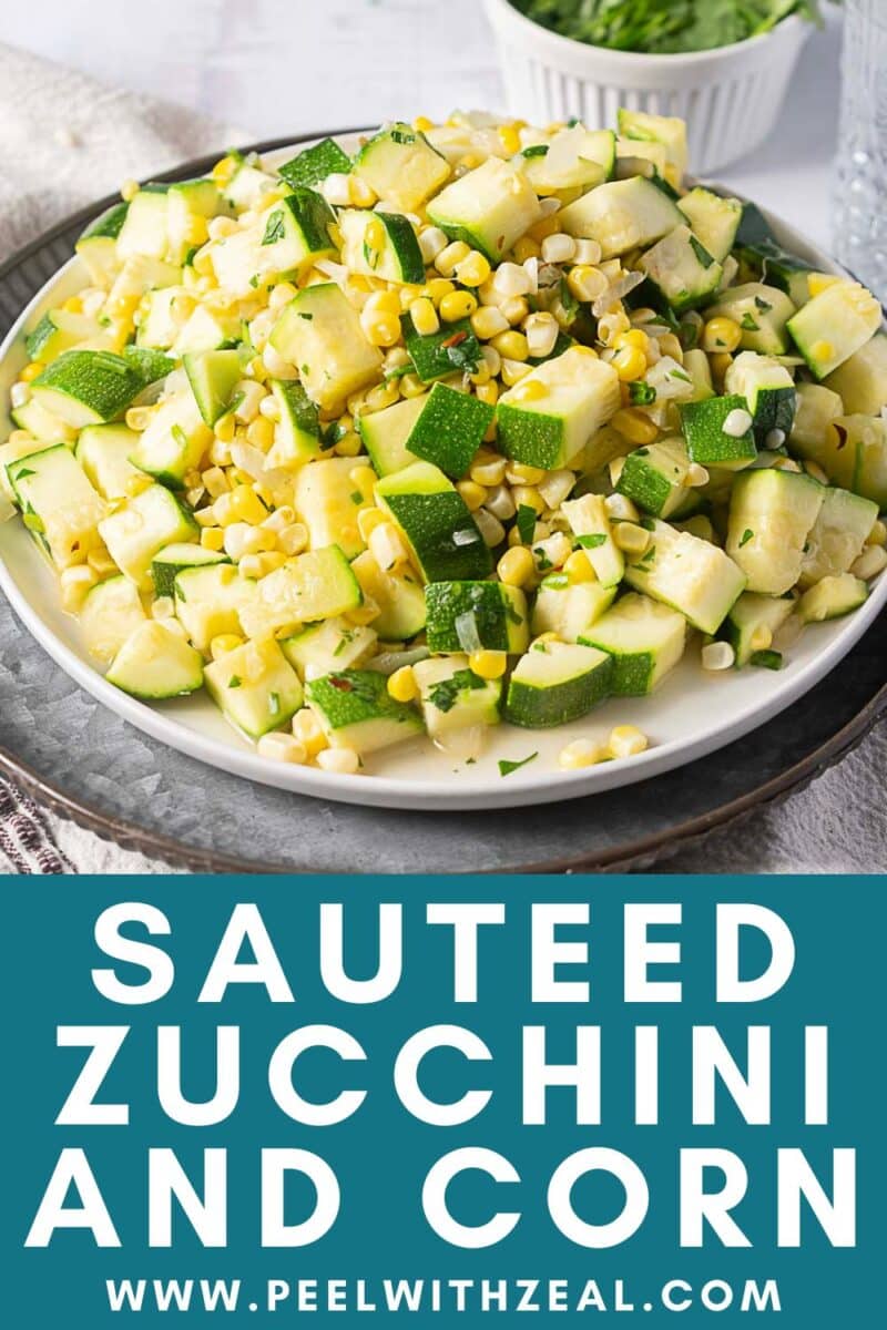 A plate of sautéed zucchini and corn sits on a table, garnished with herbs