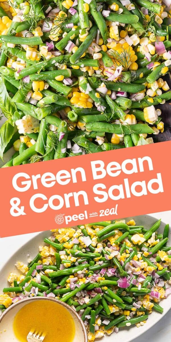A fresh green bean corn salad with chopped red onions and herbs, served on a platter beside a small bowl of vinaigrette dressing.