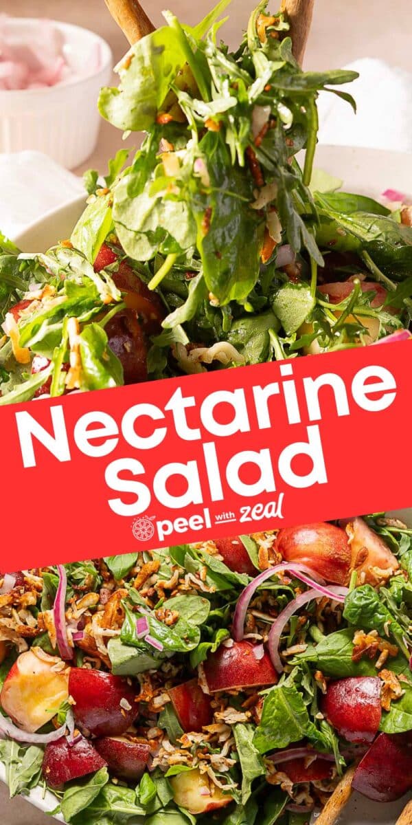 A fresh nectarine salad with greens, sliced nectarines, red onions, and herbs, topped with wooden serving utensils.