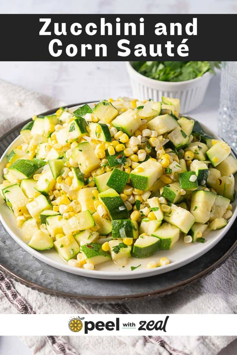 A plate of sautéed zucchini and corn garnished with chopped herbs, set on a table with a napkin and a bowl of greens in the background. The text reads "Zucchini and Corn Sauté.