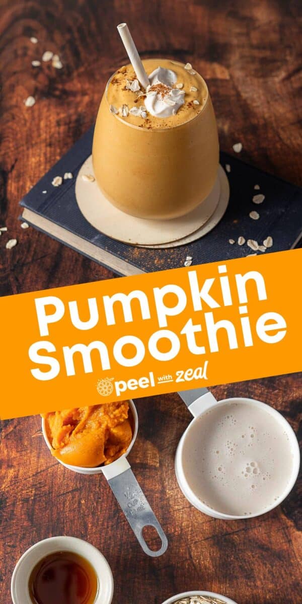 A glass of pumpkin smoothie with whipped cream and cinnamon on top sits beside ingredients like pumpkin puree, milk, and vanilla on a wooden surface.