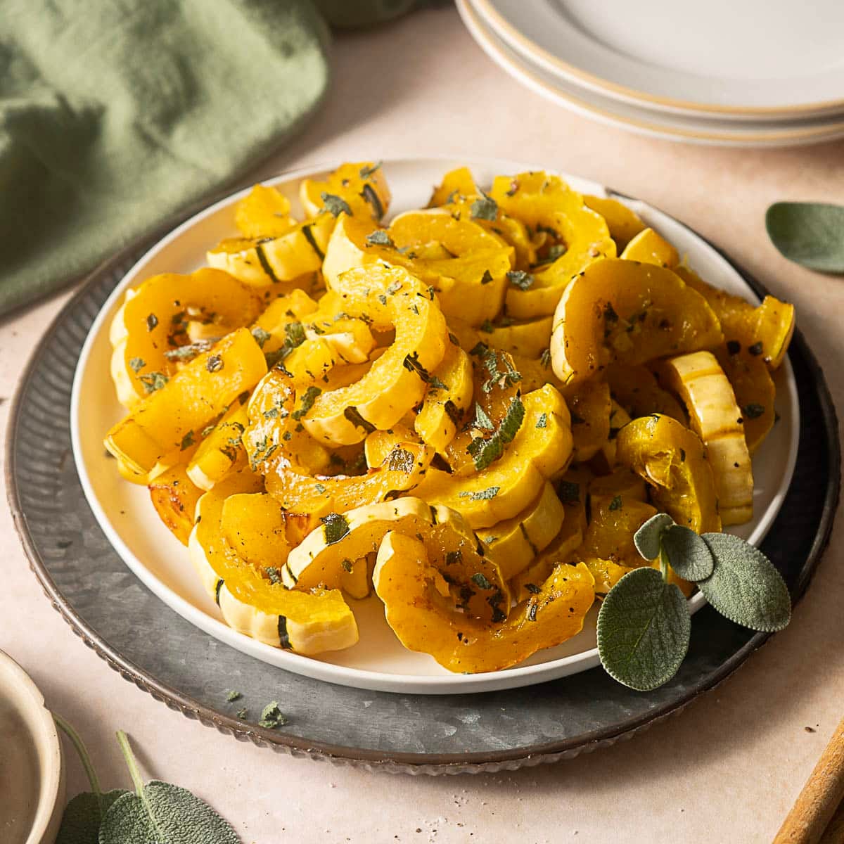 roasted delicata squash on a white plate
