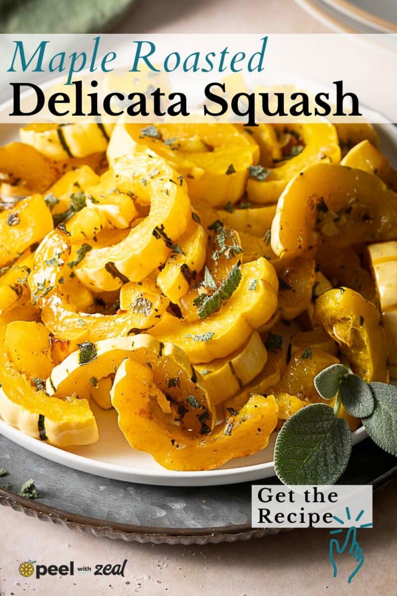A plate of sliced Roasted Delicata Squash, maple-glazed and garnished with fresh herbs, with a text overlay reading "Maple Roasted Delicata Squash" and "Get the Recipe.