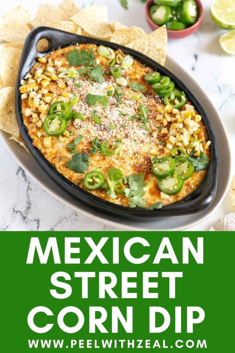 Oval dish of Mexican street corn dip topped with jalapeños, cilantro, and corn, served with tortilla chips; text reads "Mexican Street Corn Dip www.peelwithzeal.com".