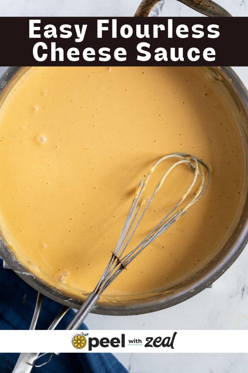 A saucepan filled with smooth, yellow cheese sauce being whisked; text above reads "Easy Flourless Cheese Sauce.