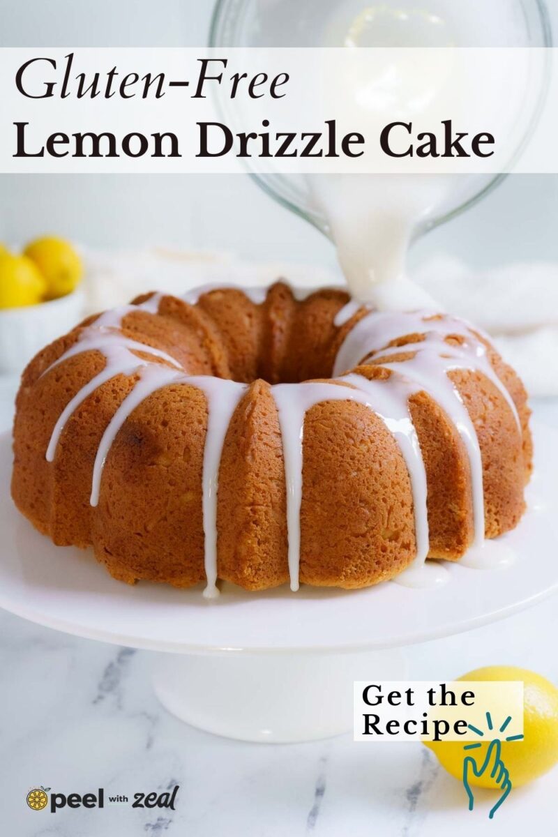 A lemon bundt cake is being drizzled with white icing on a cake stand. Text reads “Gluten-Free Lemon Drizzle Cake.” Lemons are visible in the background.