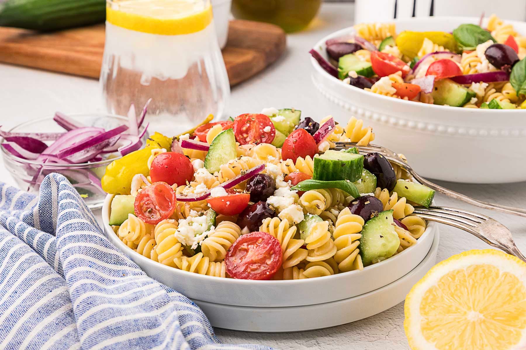 A plate of pasta salad. 
