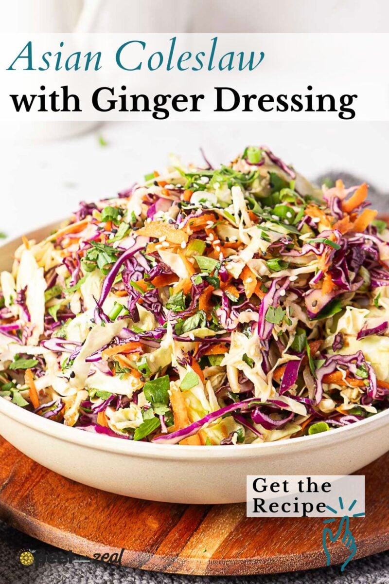 A bowl of colorful Asian coleslaw with shredded cabbage, carrots, and cilantro, served with ginger dressing.