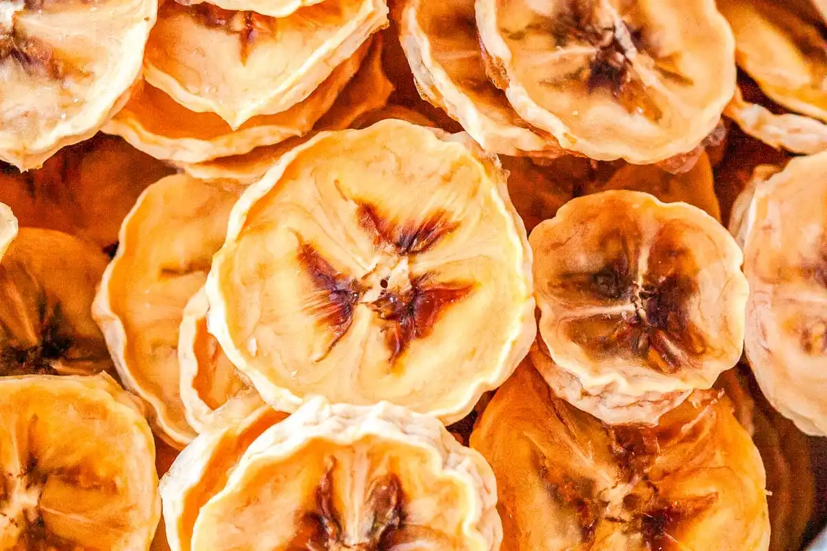 Close-up of several dried banana slices arranged in overlapping layers.