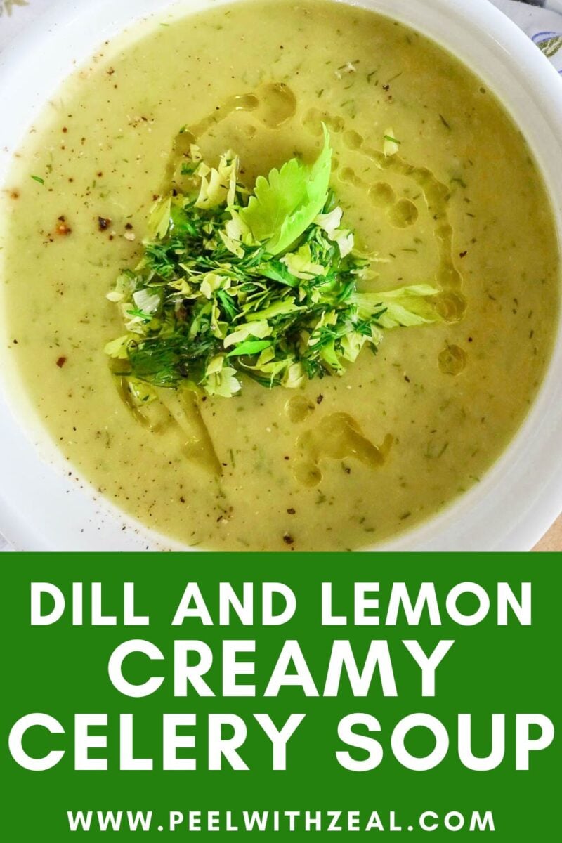 A bowl of creamy celery soup garnished with fresh herbs