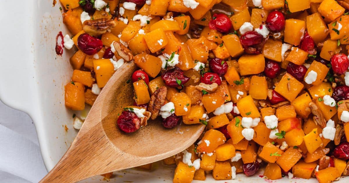 Diced roasted butternut squash, cranberries, pecans, and crumbled white cheese—a perfect recipes without pancakes idea for creative maple syrup uses.